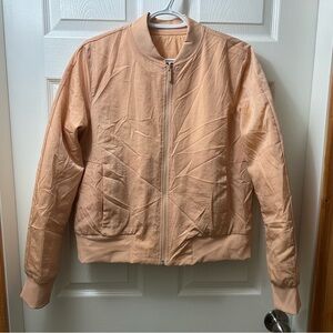 Lulu🍋Non-Stop Reversible Bomber Jacket in the color Bleached Apricot Size 10